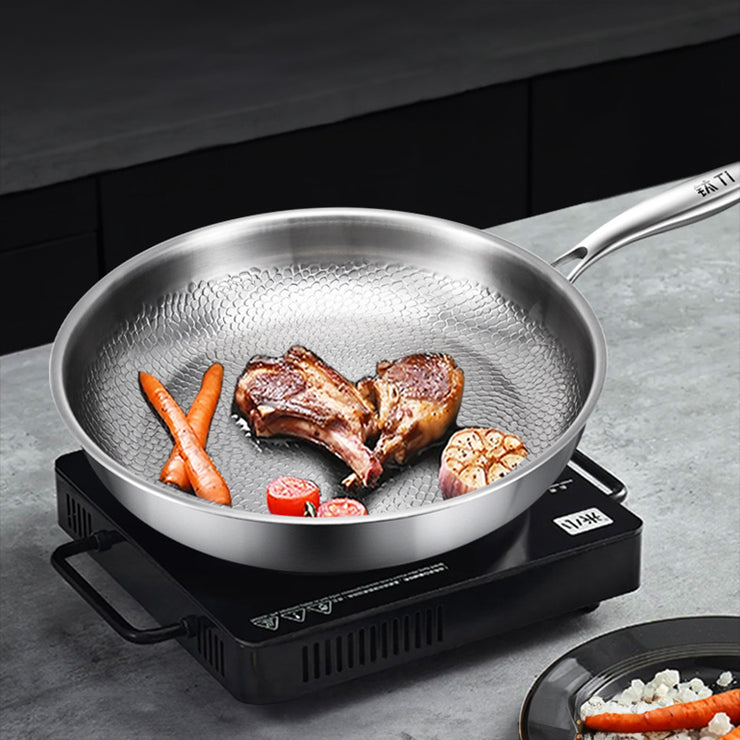 German uncoated pure titanium frying pan with fish